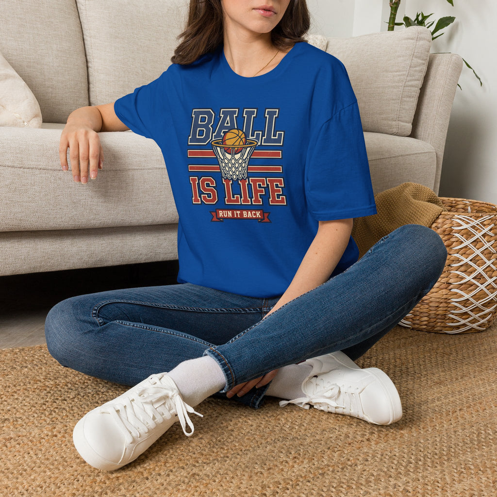 Royal blue basketball T-shirt with 'BALL IS LIFE' hoop graphic, worn by model
