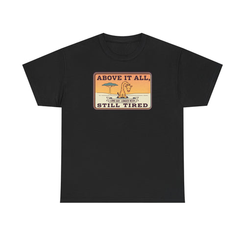 Black short-sleeve crewneck tee with chest “Above It All, Still Tired” graphic badge.