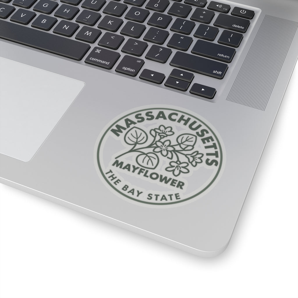 Circular Massachusetts Mayflower state flower decal on laptop lid, gray botanical and lettering