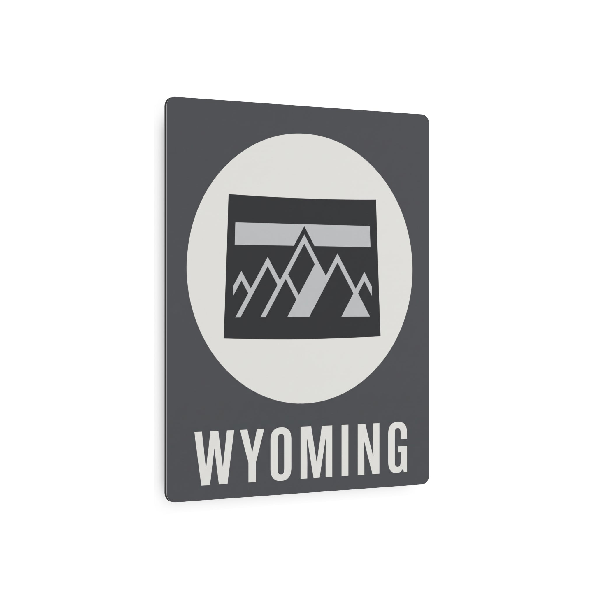 Wyoming metal wall art square with white circle, mountain badge, and WYOMING text on dark gray