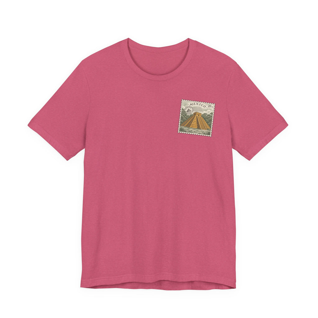 Rose crew-neck t-shirt with small vintage Mexico postage-stamp graphic on chest.