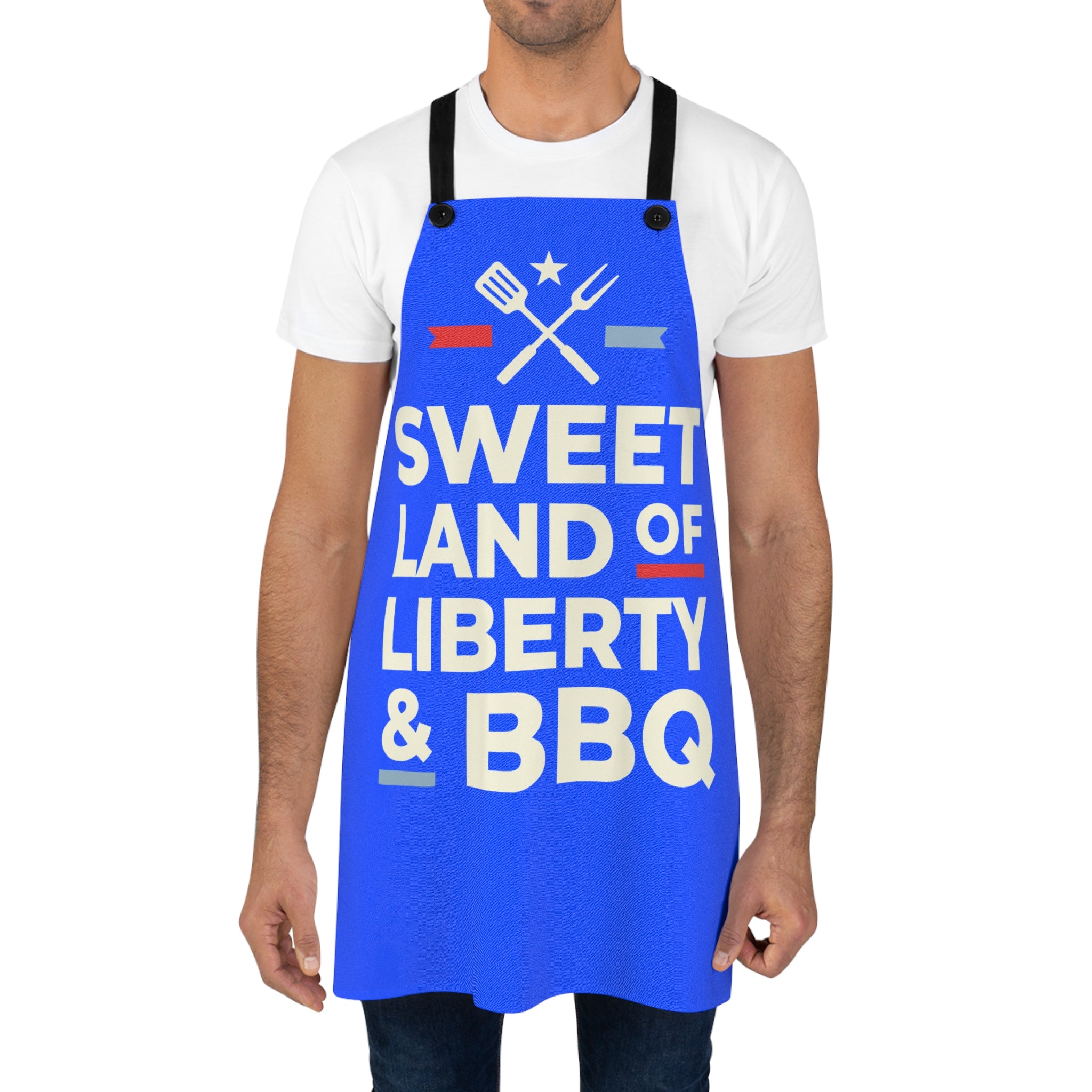 Blue BBQ apron worn by man, 'Sweet Land of Liberty & BBQ' utensil graphic