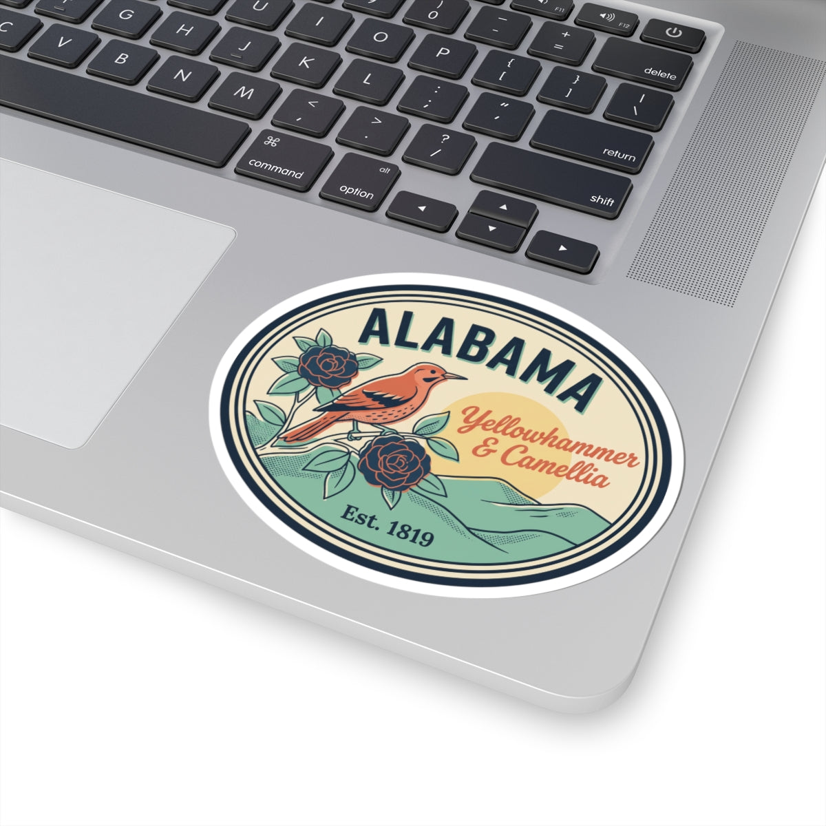Alabama oval vinyl sticker on laptop lid, "ALABAMA" header and "Est. 1819"