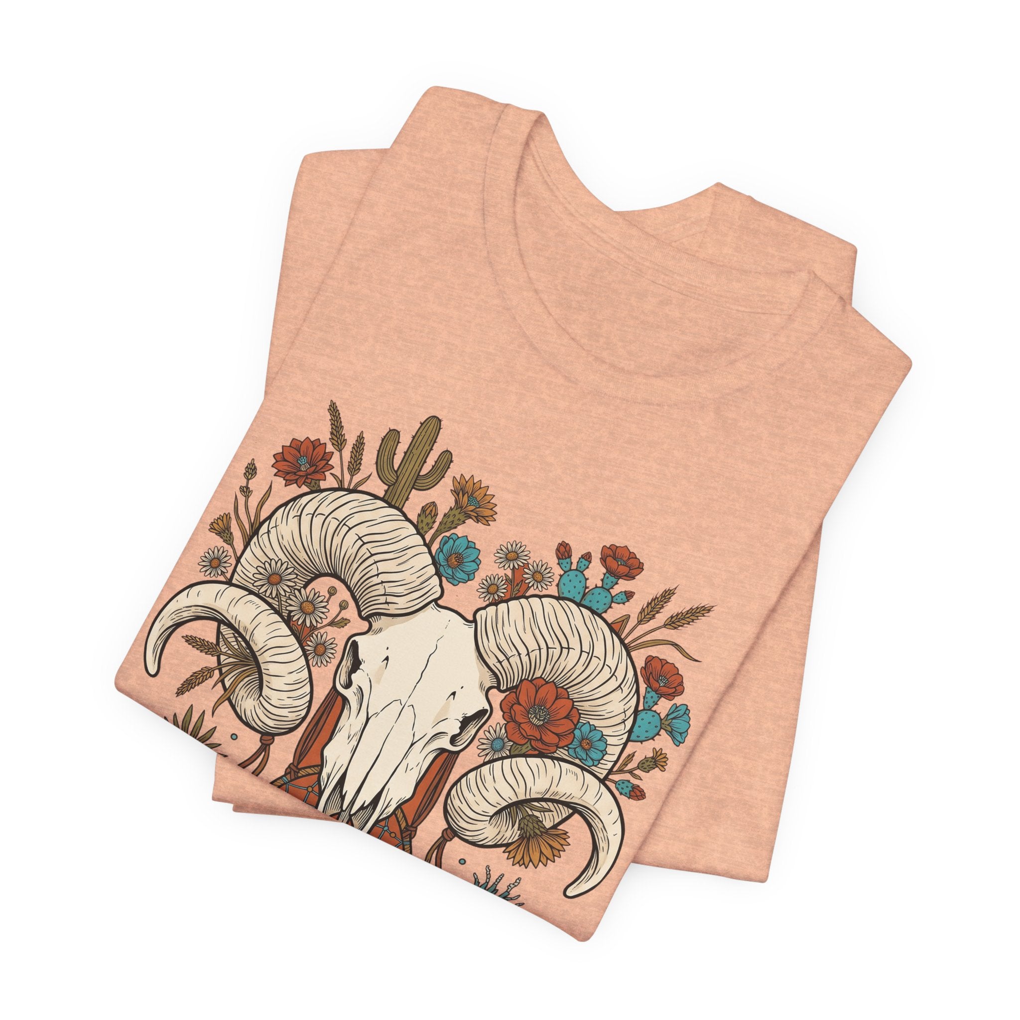 Peach t-shirt with ram skull horns floral dreamcatcher and cactus graphic