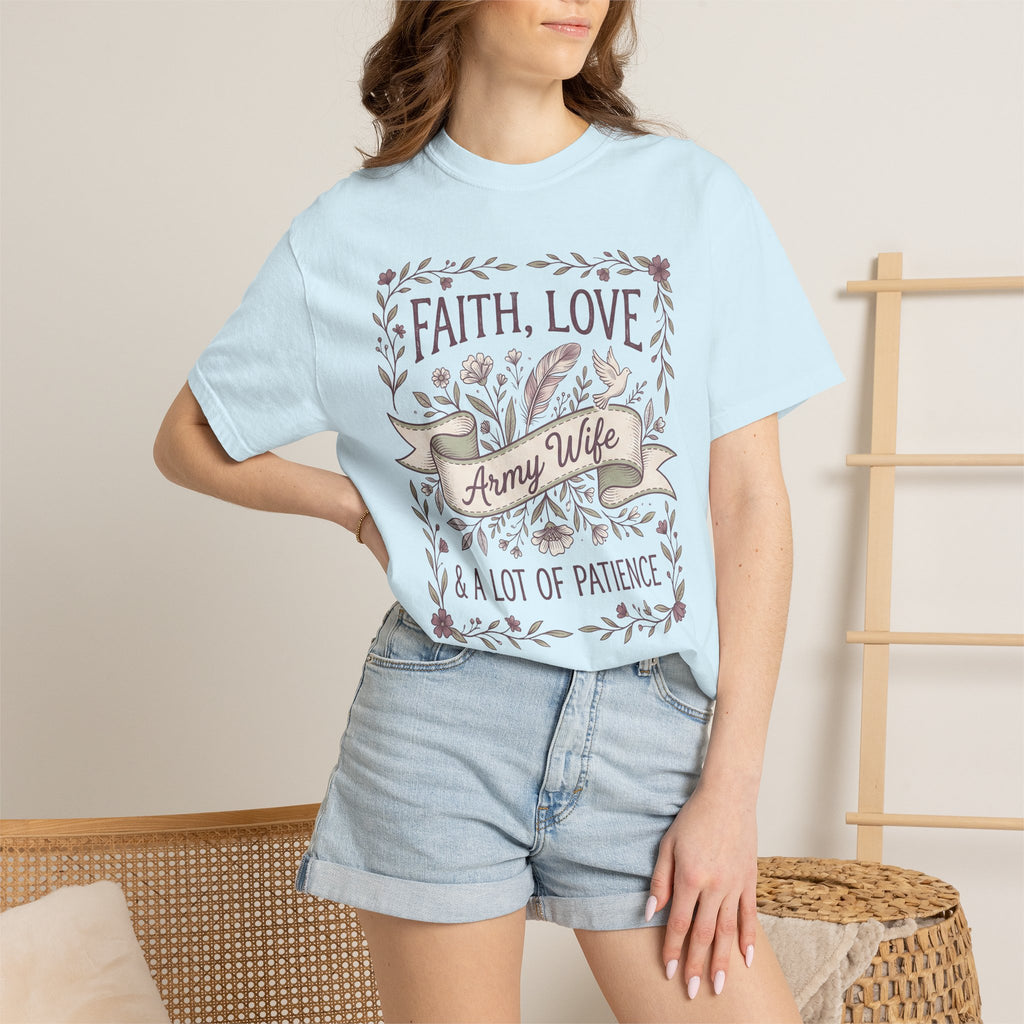 Light blue crew-neck T-shirt worn by model; floral “FAITH, LOVE” and “Army Wife”