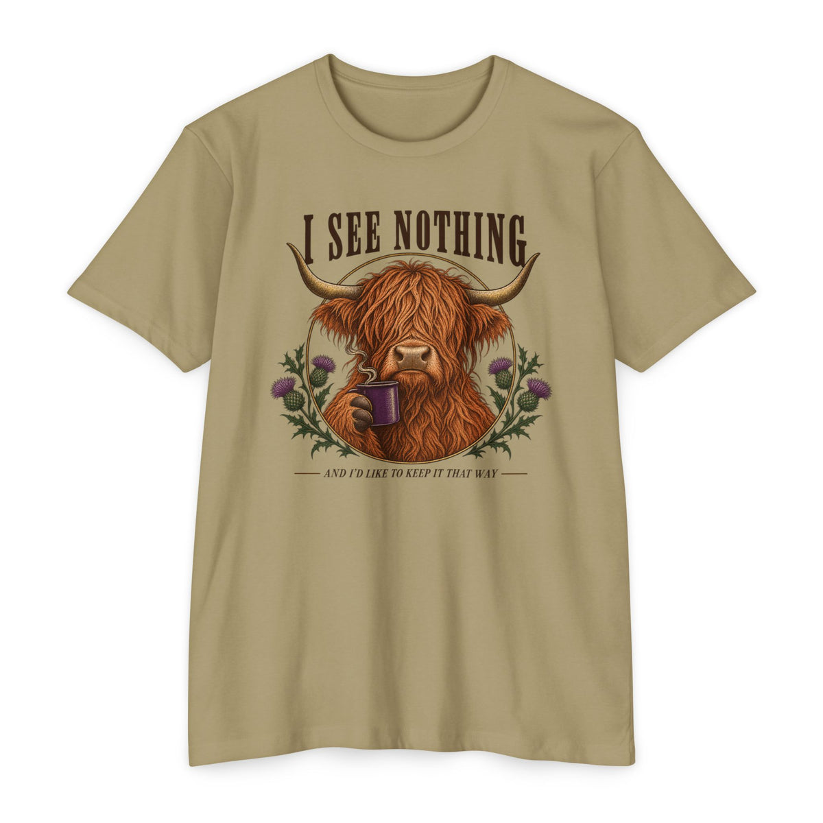 Light tan short-sleeve graphic T-shirt with Highland cow holding a coffee mug