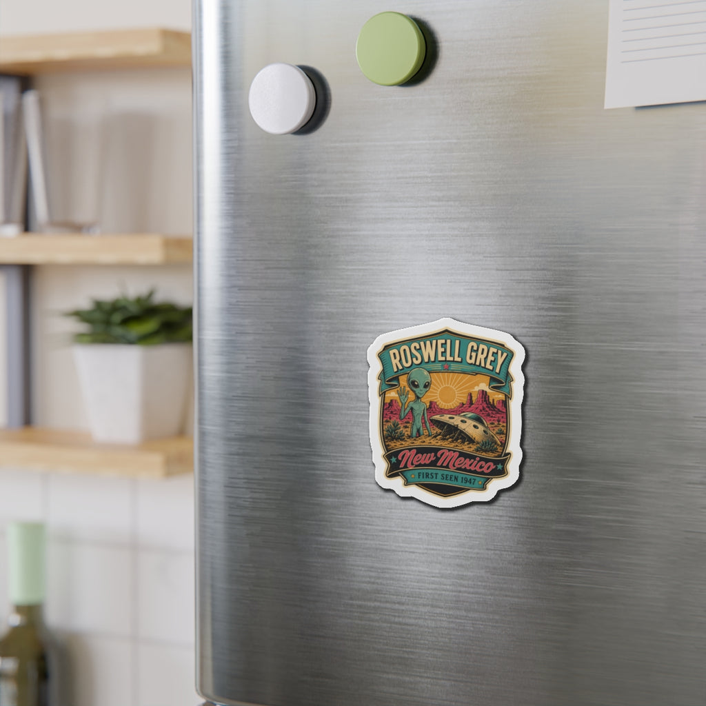 Roswell Grey die-cut refrigerator magnet on brushed metal refrigerator
