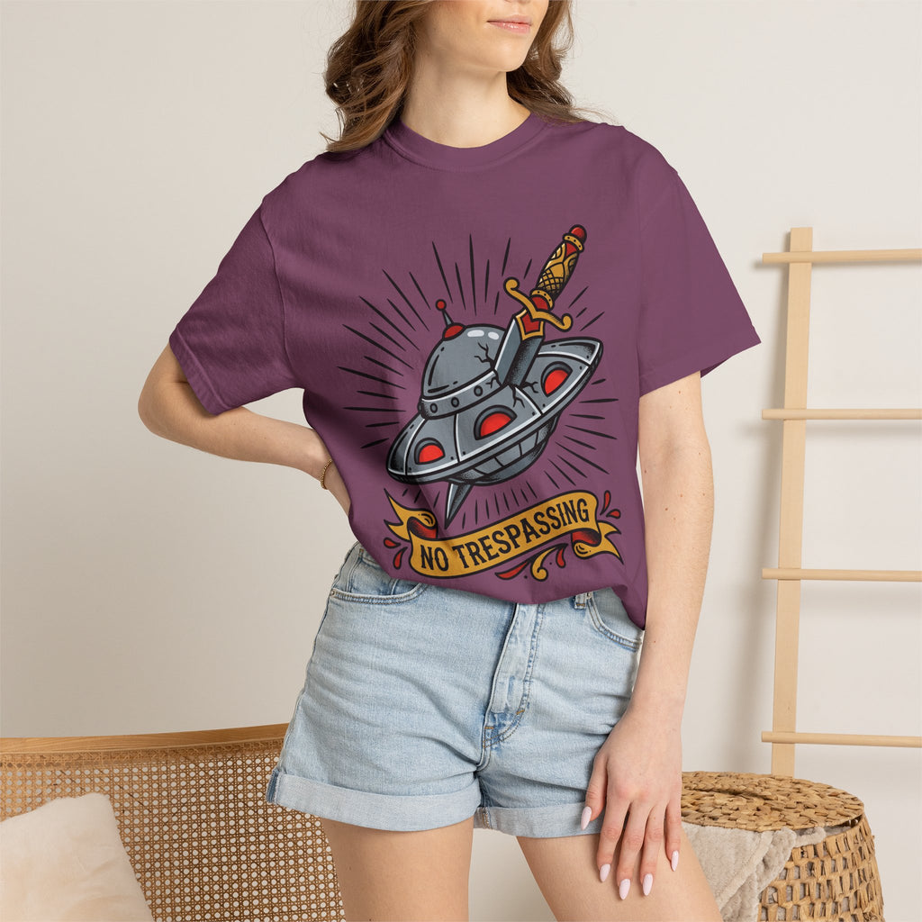 Purple T-shirt with UFO dagger graphic and “NO TRESPASSING” text on front