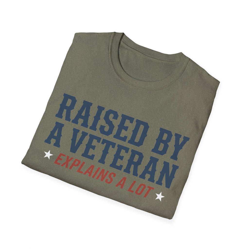 Military green crewneck T-shirt with 'RAISED BY A VETERAN' text graphic.