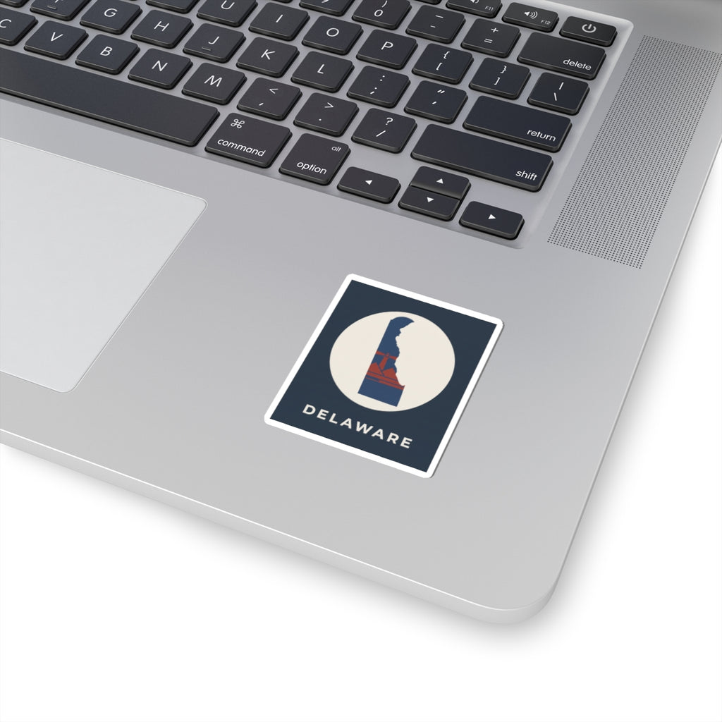 Delaware state silhouette kiss-cut sticker, blue emblem on cream circle