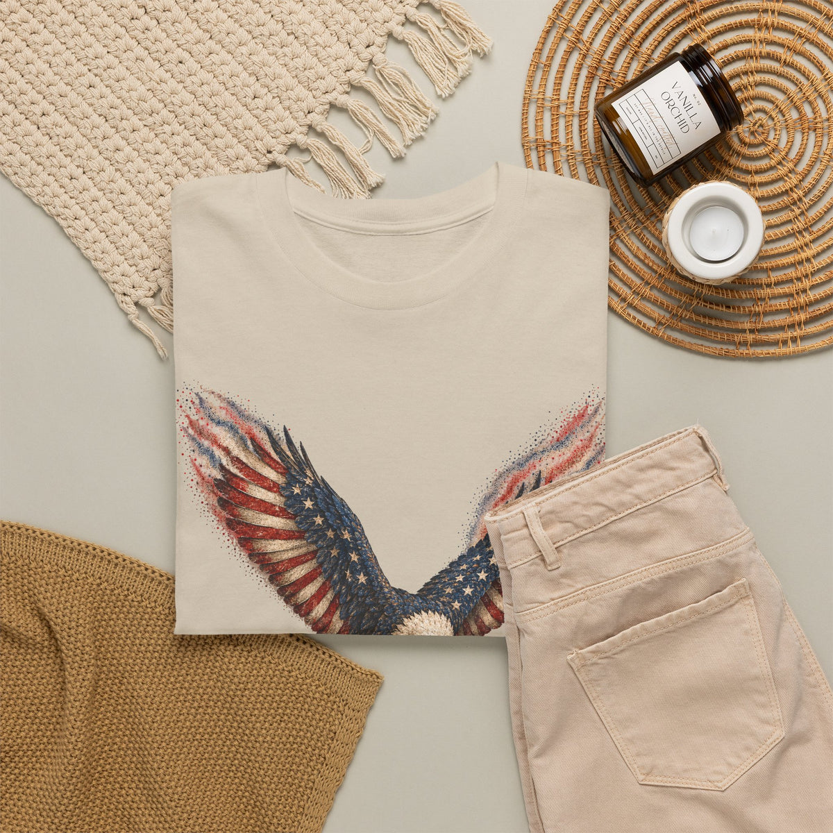 Beige crew-neck t-shirt with colorful American flag eagle wing graphic, front.