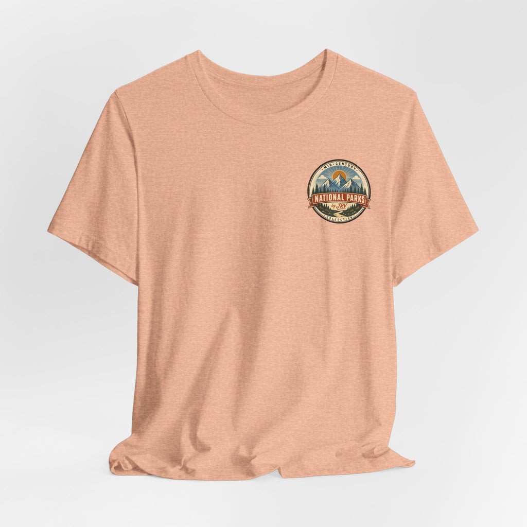 Peach crew-neck t-shirt with small circular National Park emblem graphic
