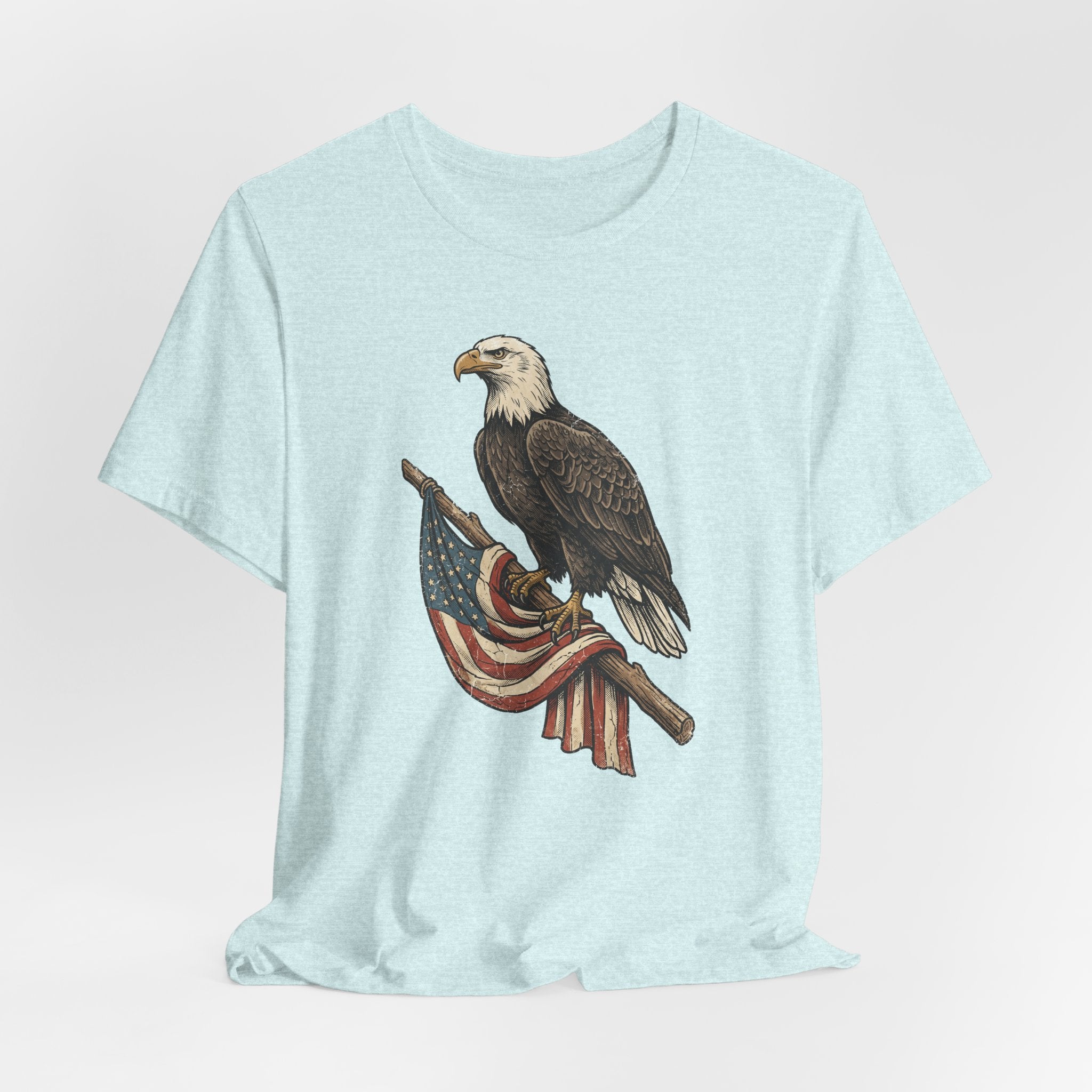 Light blue heather bald eagle graphic t-shirt with flag ribbon print