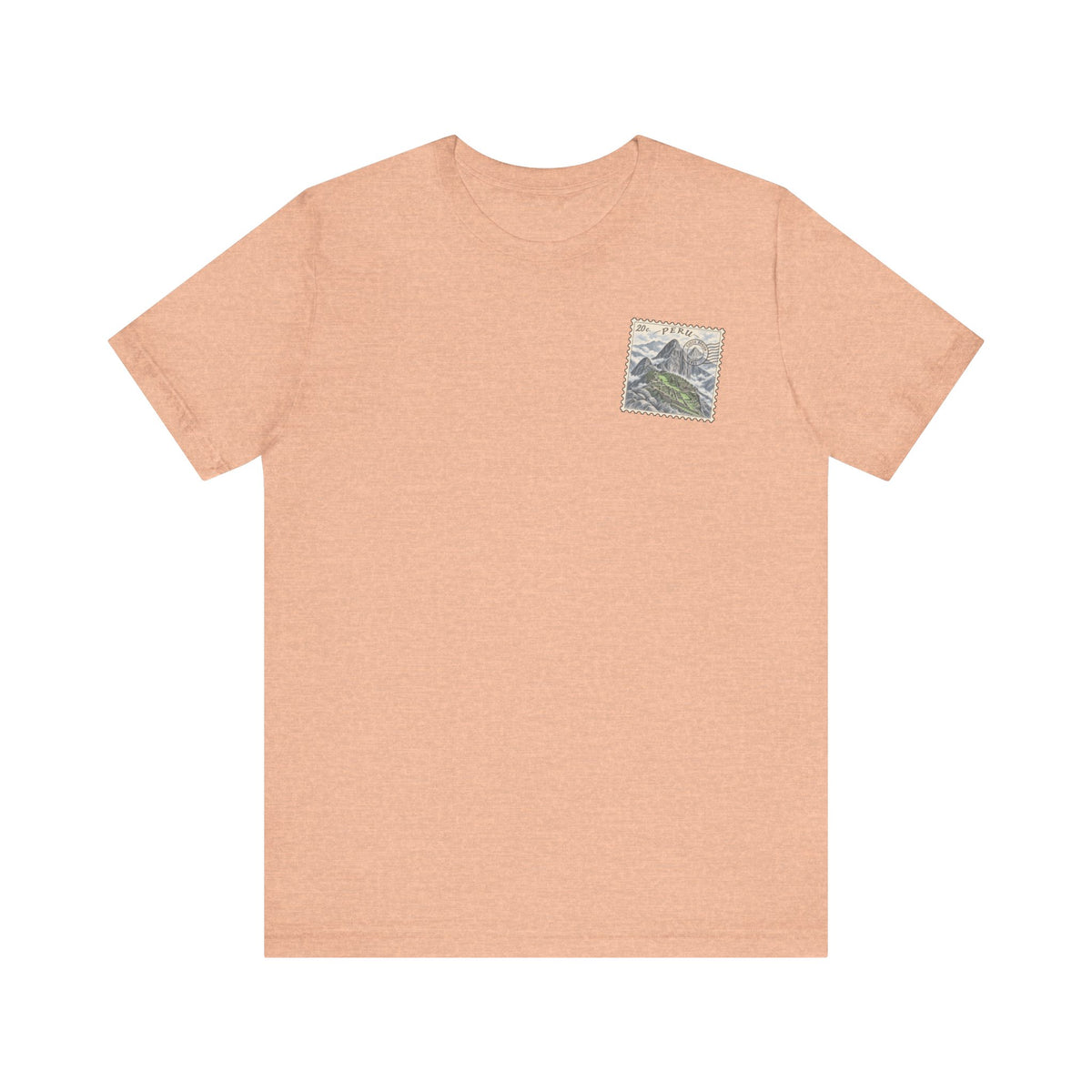 Heather peach T-shirt with small square chest patch featuring a landscape illustration