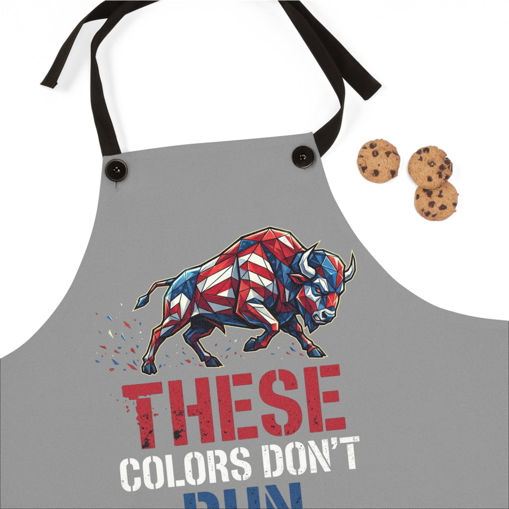 Gray apron close-up with bull graphic and “THESE COLORS DON’T RUN”