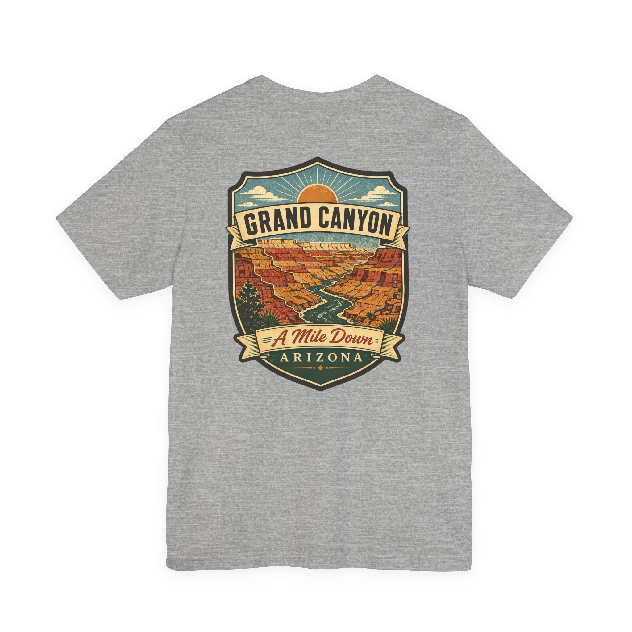 Heather gray crew-neck T-shirt with large Grand Canyon scenic badge graphic reading "A Mile Down"