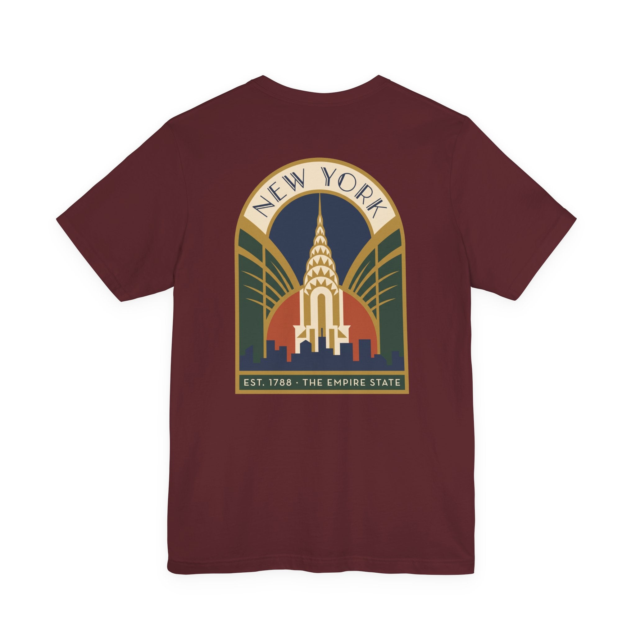 Maroon T-shirt with Art Deco New York skyline emblem graphic, arched text