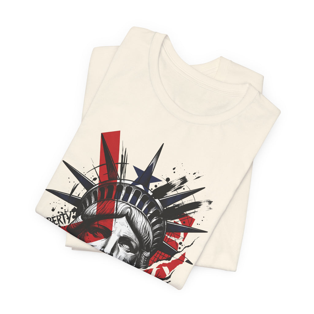 Cream graphic T-shirt with red, white, and black Statue of Liberty portrait print