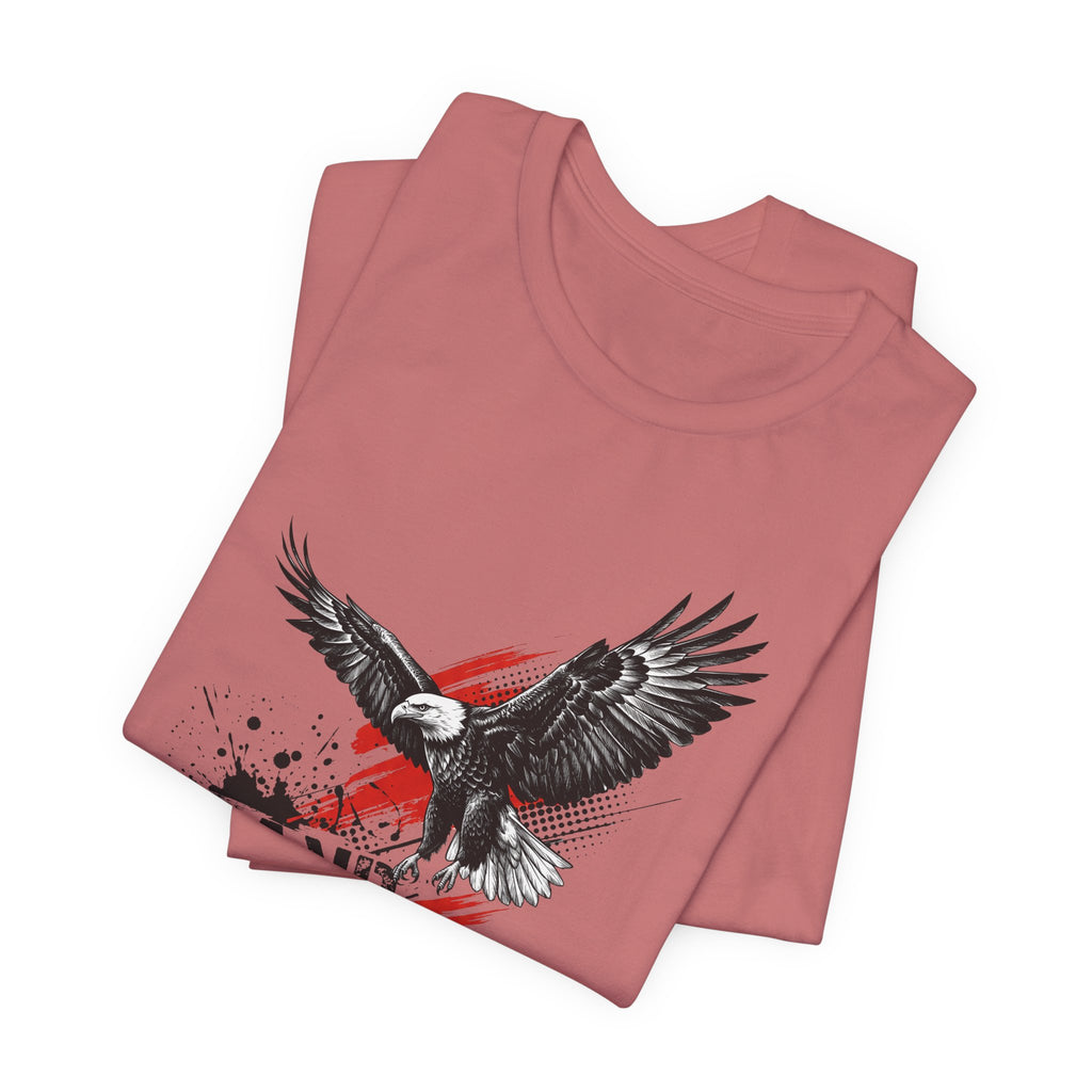 Dusty rose crewneck T-shirt with black eagle graphic and red/blue splatter