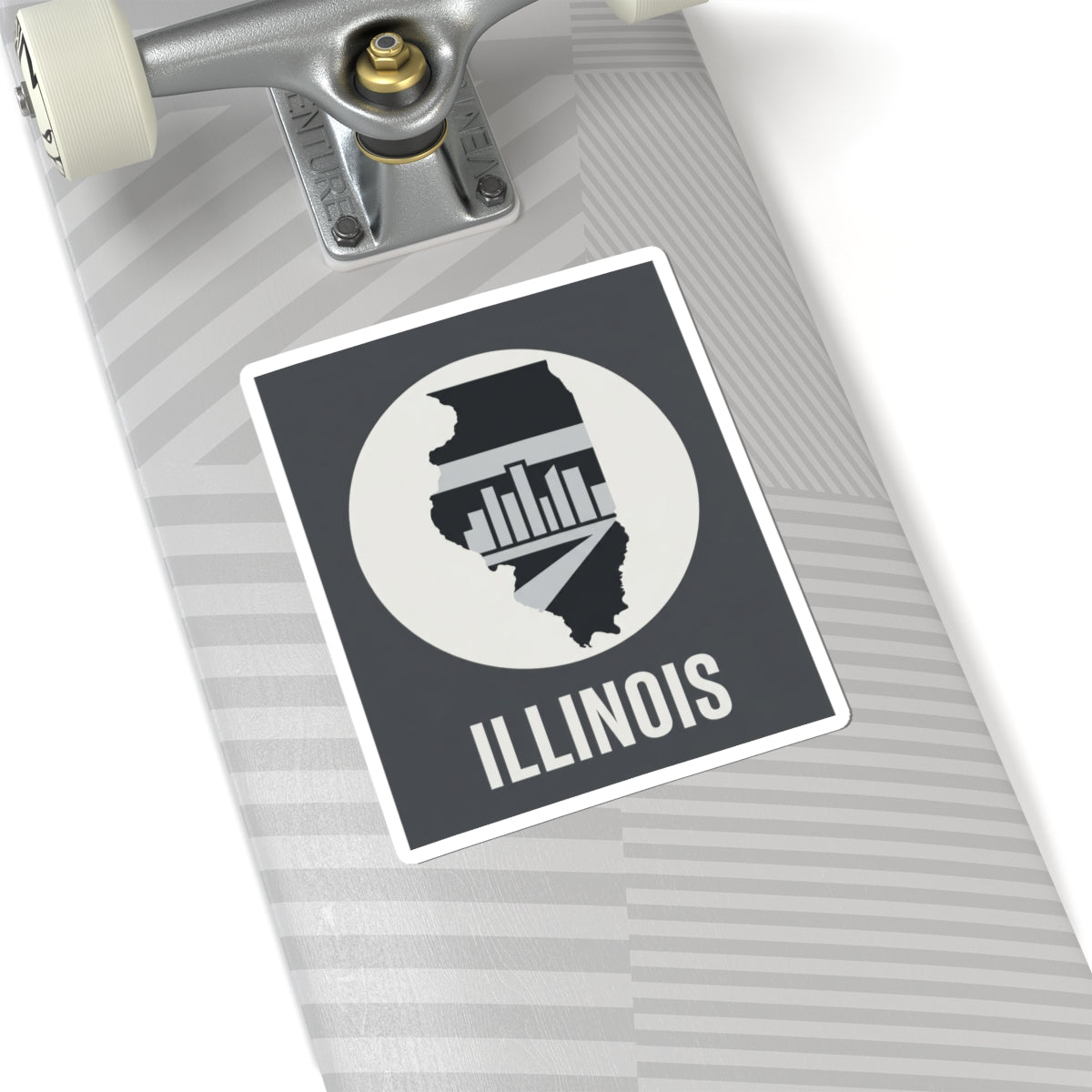 Illinois skyline state sticker on a skateboard deck, with “ILLINOIS”
