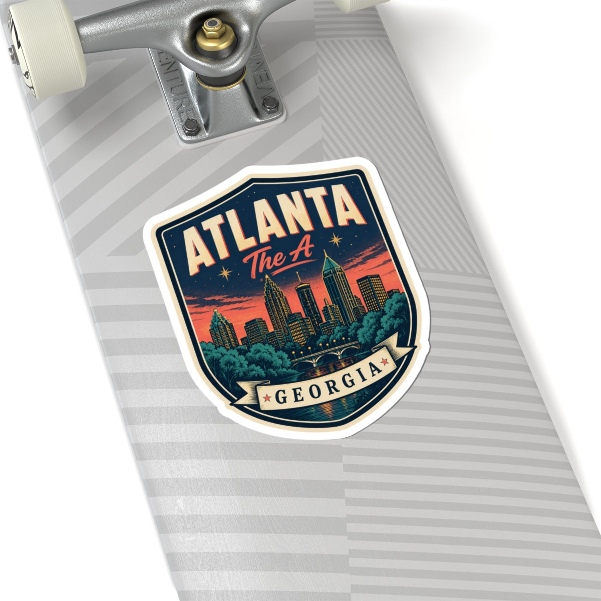 Atlanta Georgia luggage tag sticker on striped luggage surface, shield badge