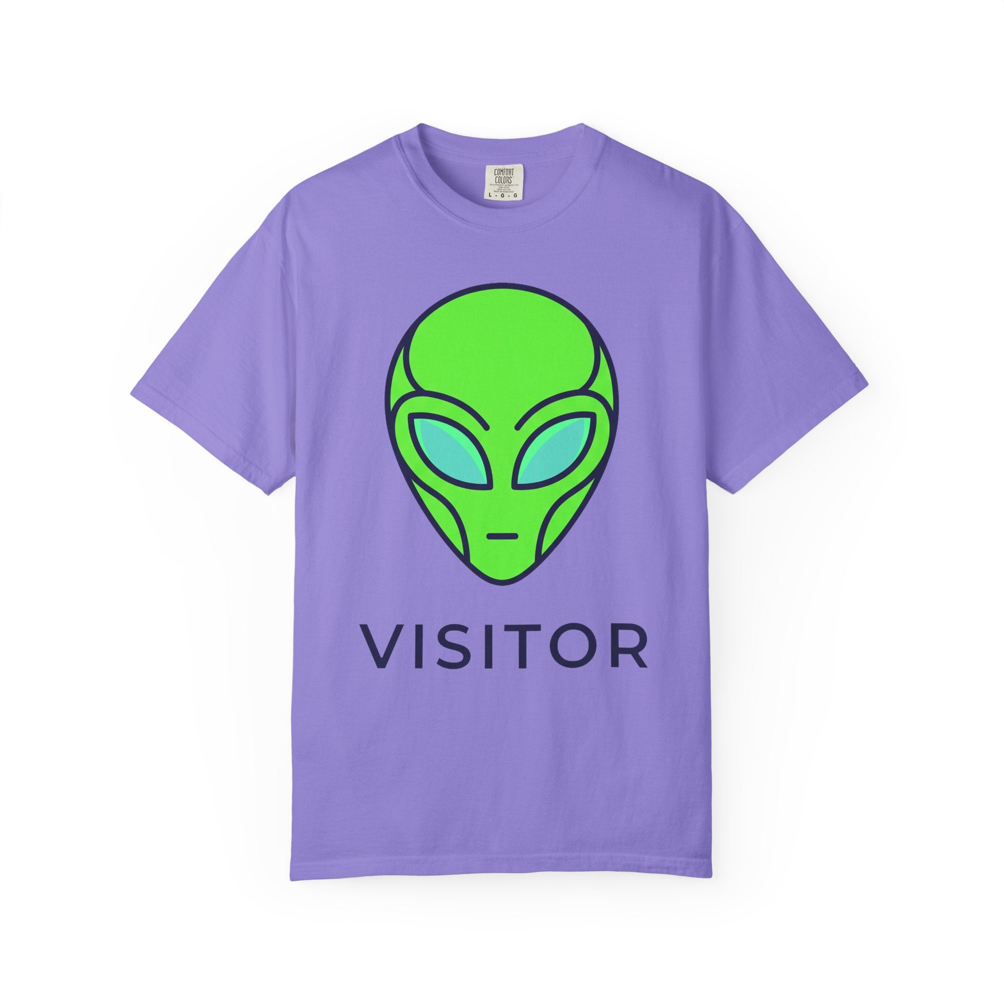 Alien visitor T-shirt in lavender with neon green alien face and “VISITOR” text