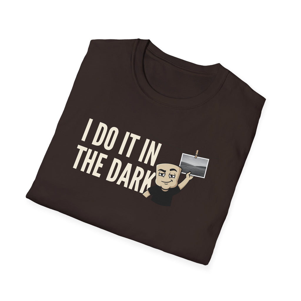 Dark brown T-shirt with "I DO IT IN THE DARK" graphic and cartoon photographer