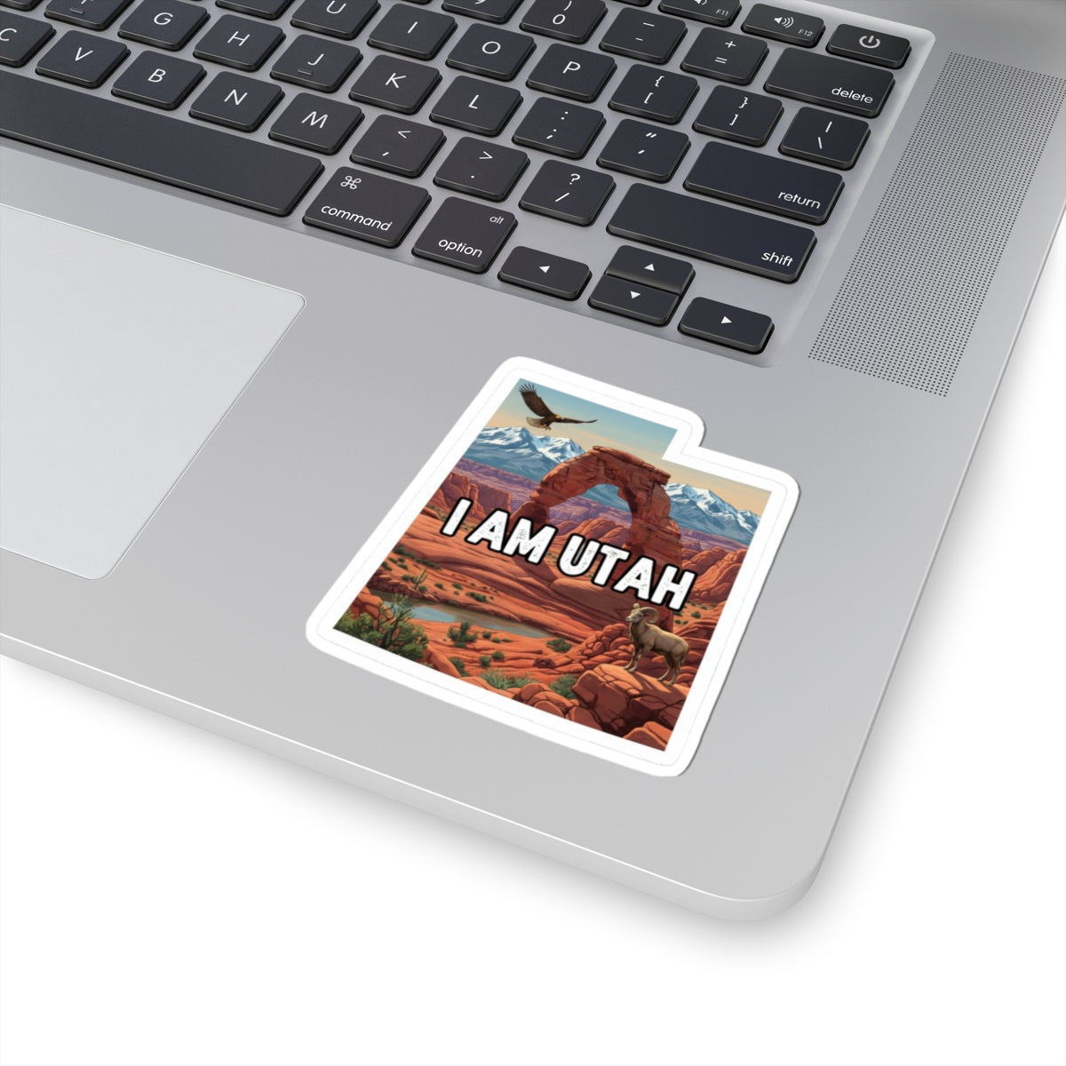 Utah “I AM UTAH” kiss-cut decal with white border on laptop