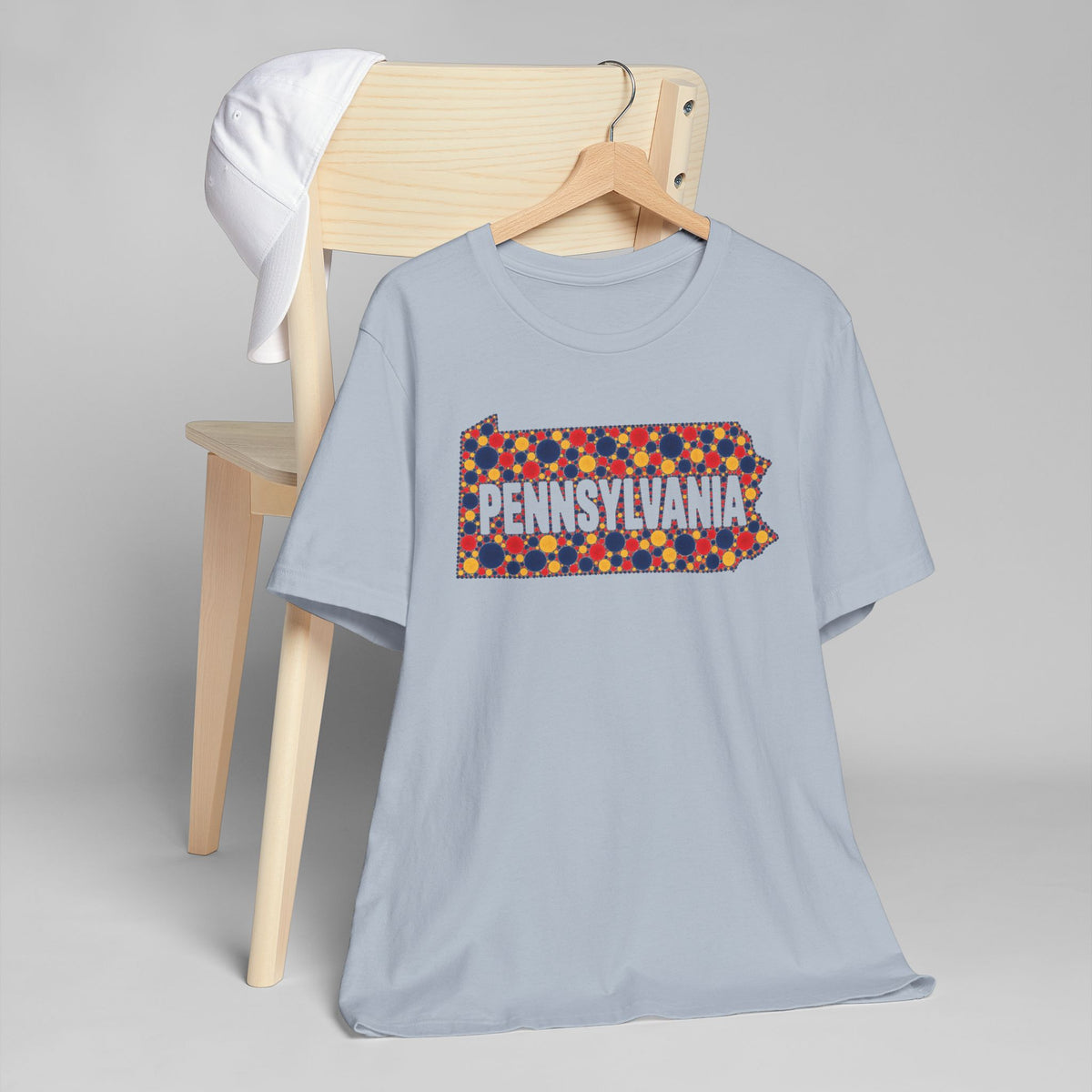 Light blue T-shirt with colorful Pennsylvania floral map graphic