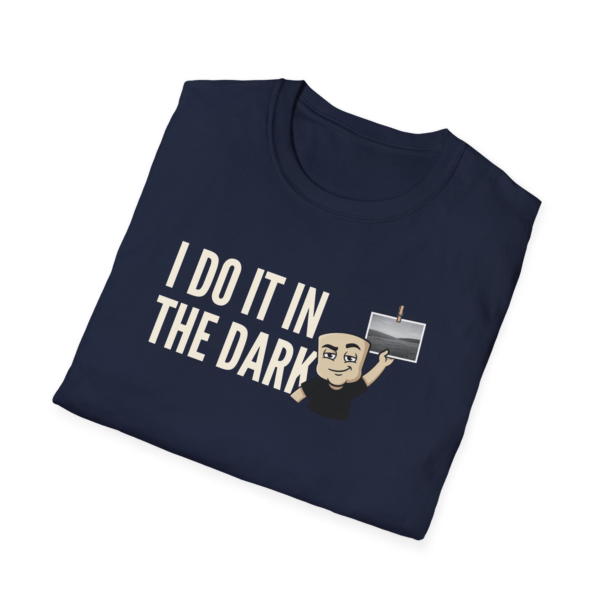 Navy blue T-shirt with "I DO IT IN THE DARK" graphic and cartoon photographer