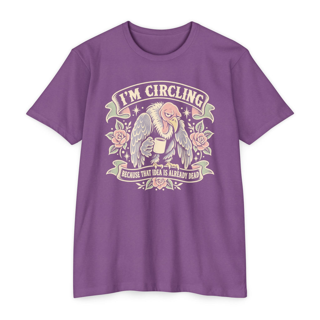Purple vulture graphic T-shirt with winged face and “I’m circling” text