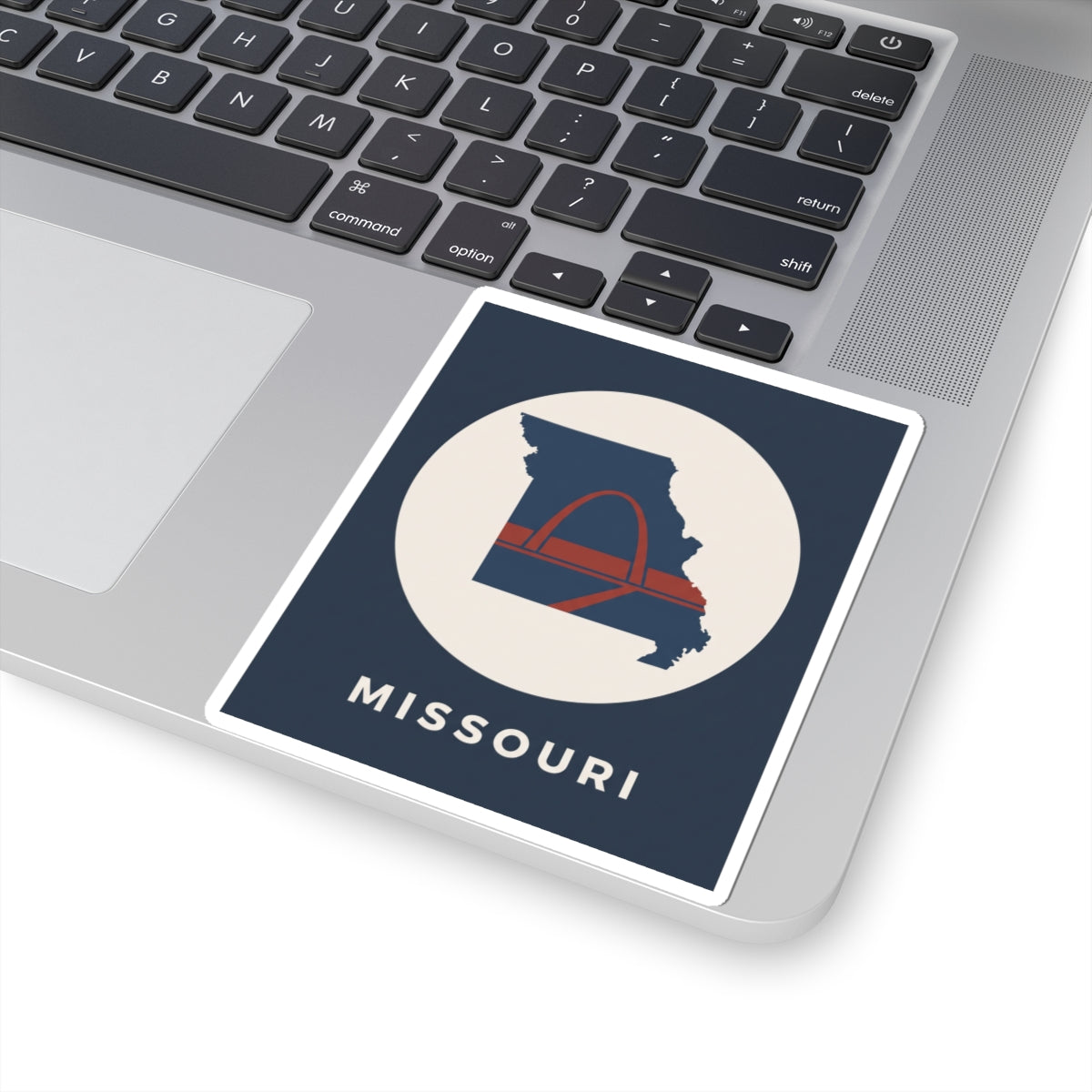 Missouri arch graphic sticker with state silhouette and MISSOURI text on a device