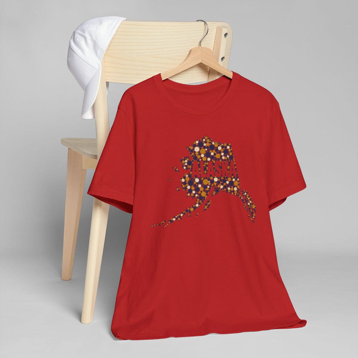Red Alaska graphic t-shirt with colorful state outline on chest