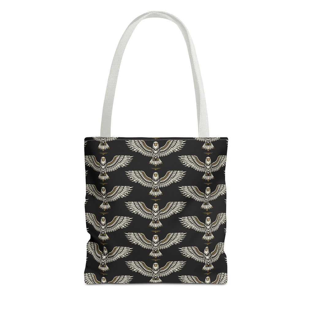 Tote bag with black fabric and repeating gold winged scarab pattern, white handles