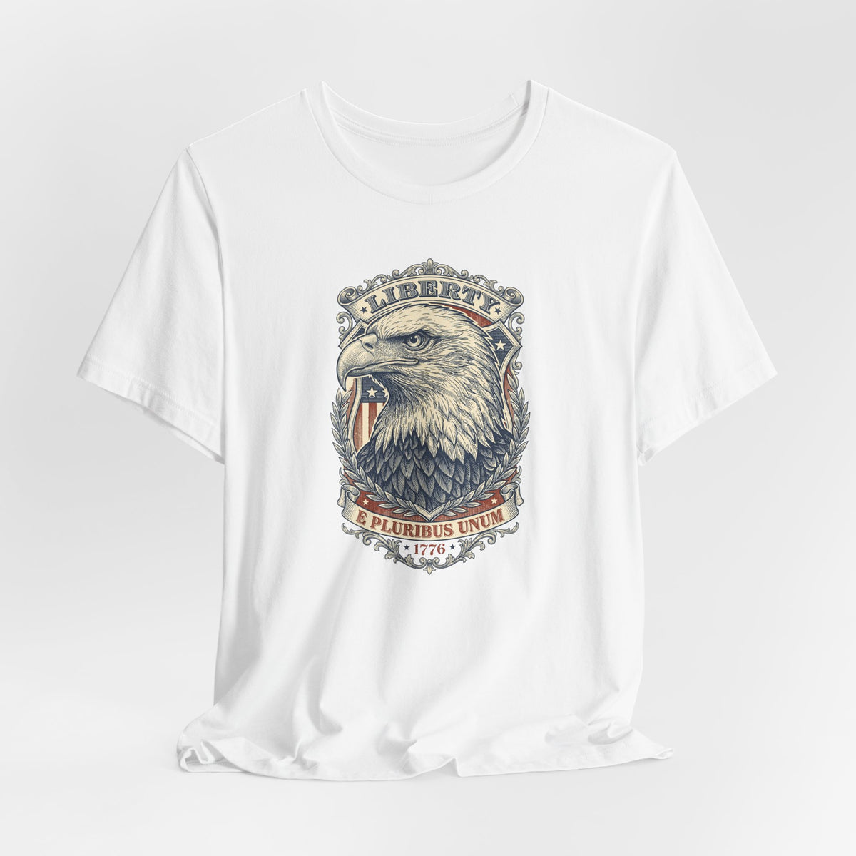 White graphic t-shirt featuring bald eagle head and patriotic banner at chest
