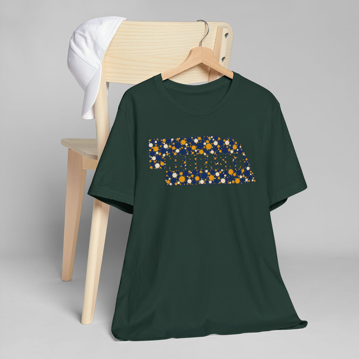 Dark green T-shirt with colorful state outline graphic