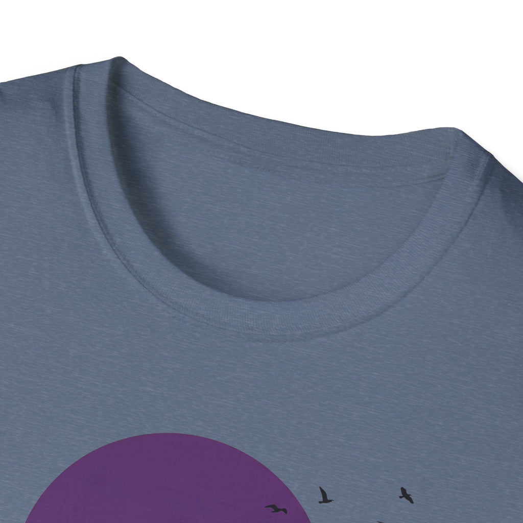 Blue-gray T-shirt neckline with partial purple moon and flying bird silhouettes visible