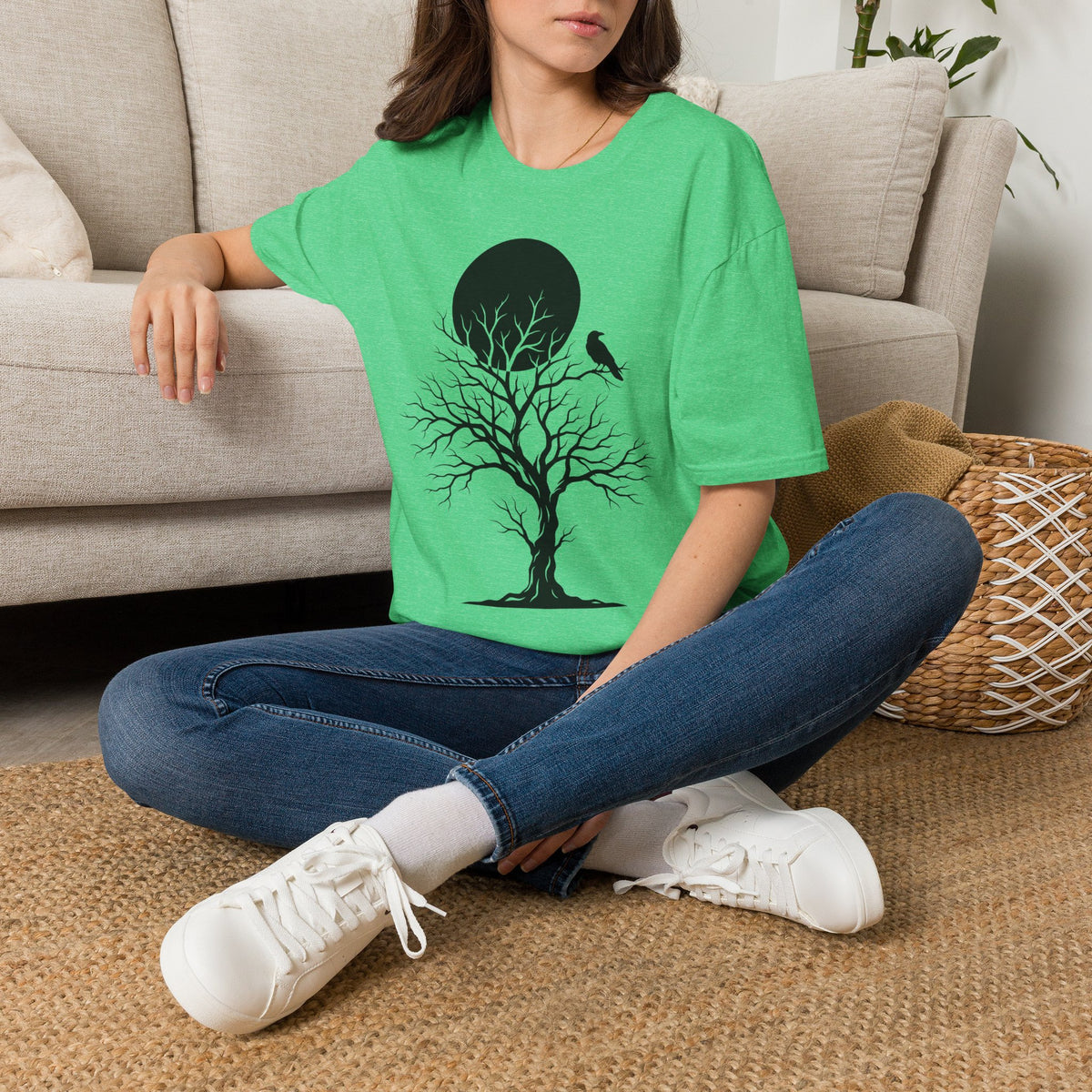 Bright green t-shirt with black moonlit tree silhouette and crow graphic