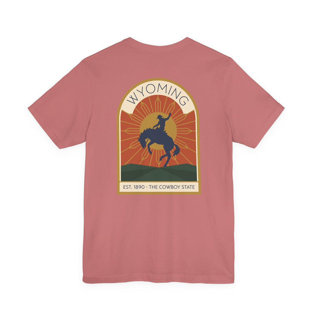 Mauve pink T-shirt with Wyoming rodeo bucking bronco graphic on front