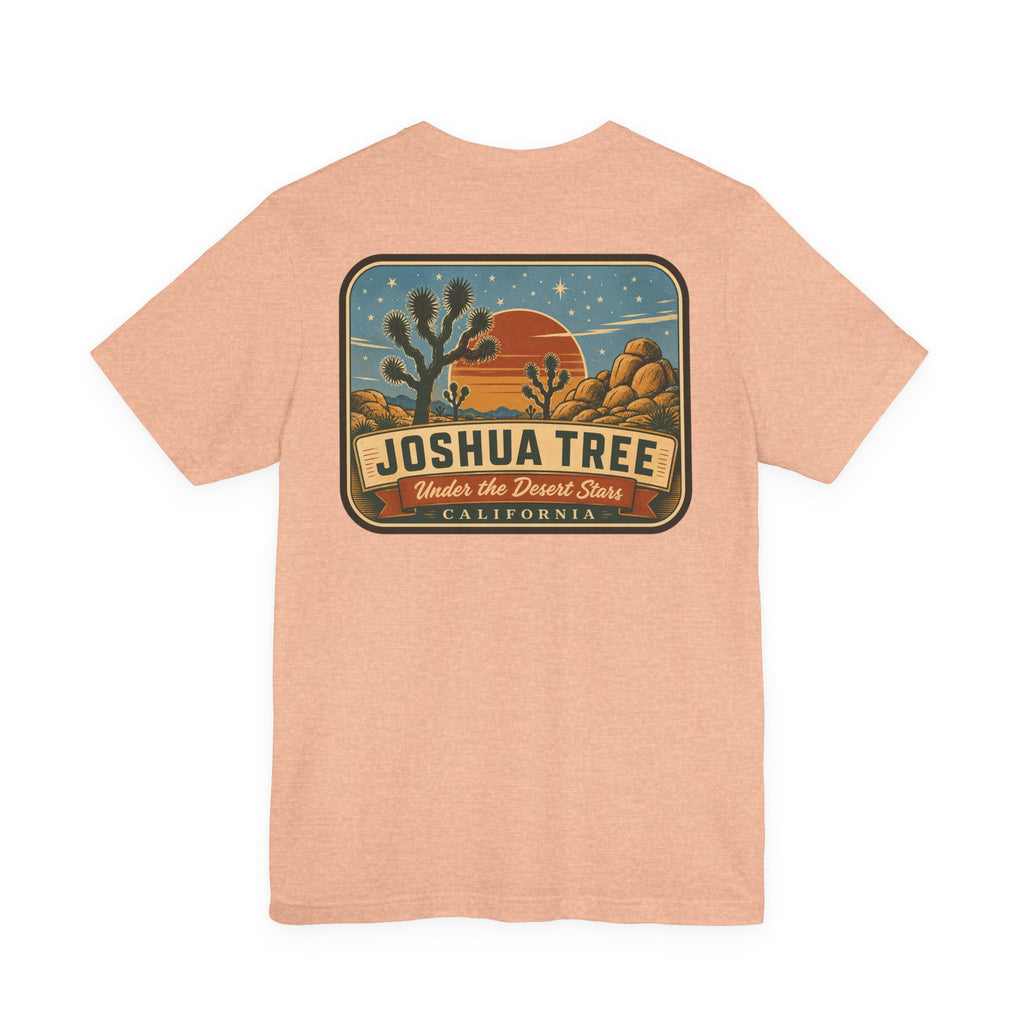 Heather peach t-shirt with Joshua Tree desert sign graphic on front.