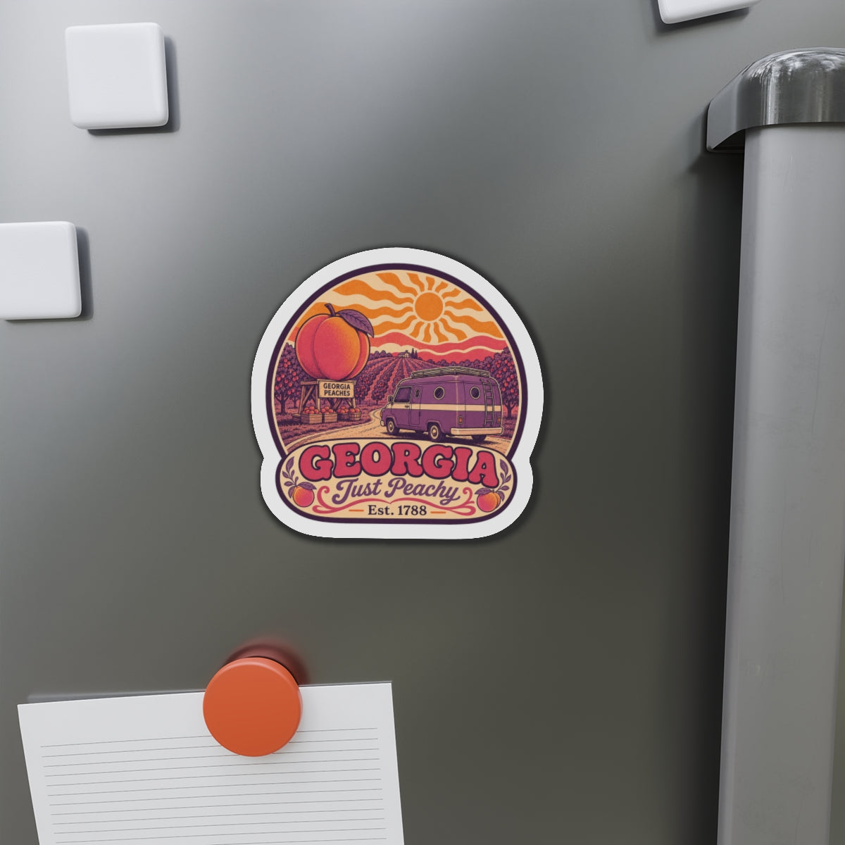 Die-cut magnet on fridge, 'GEORGIA' banner and 'Est. 1788' under peach and van artwork