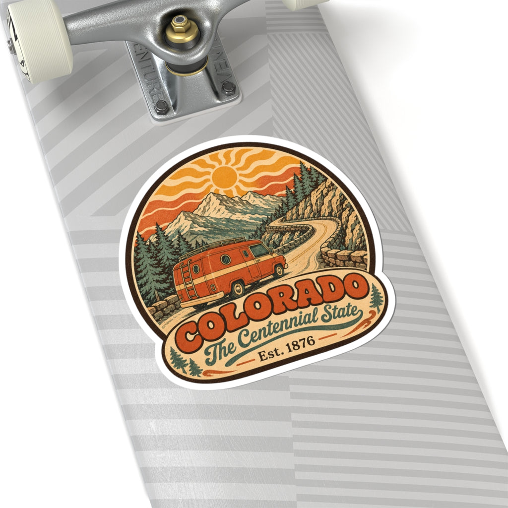 Colorado sticker on a gray skateboard deck, showing orange van and "Est. 1876"