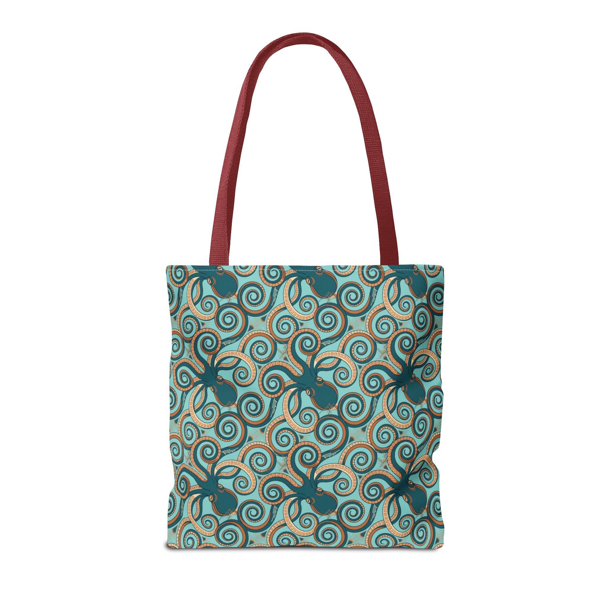 Teal octopus swirl tote bag with red handles, front view