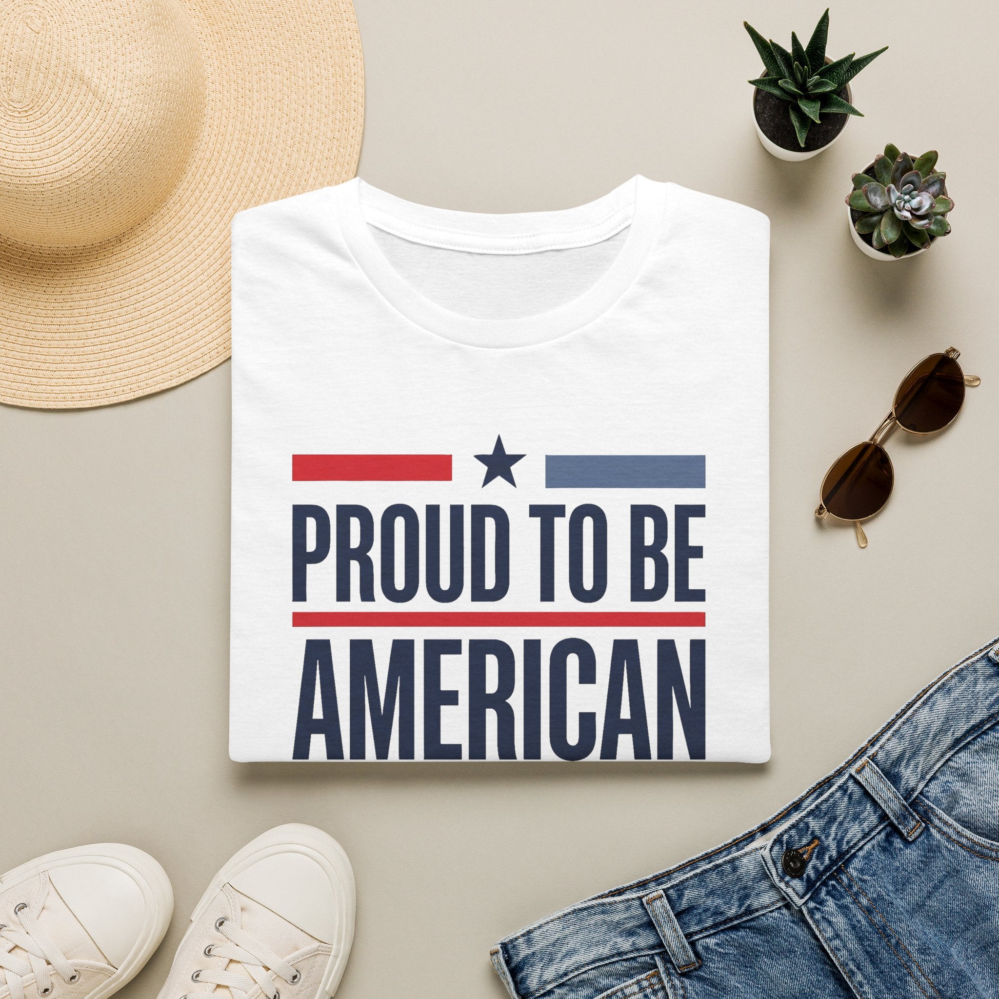 White crewneck T-shirt with star-and-stripe "PROUD TO BE AMERICAN" print
