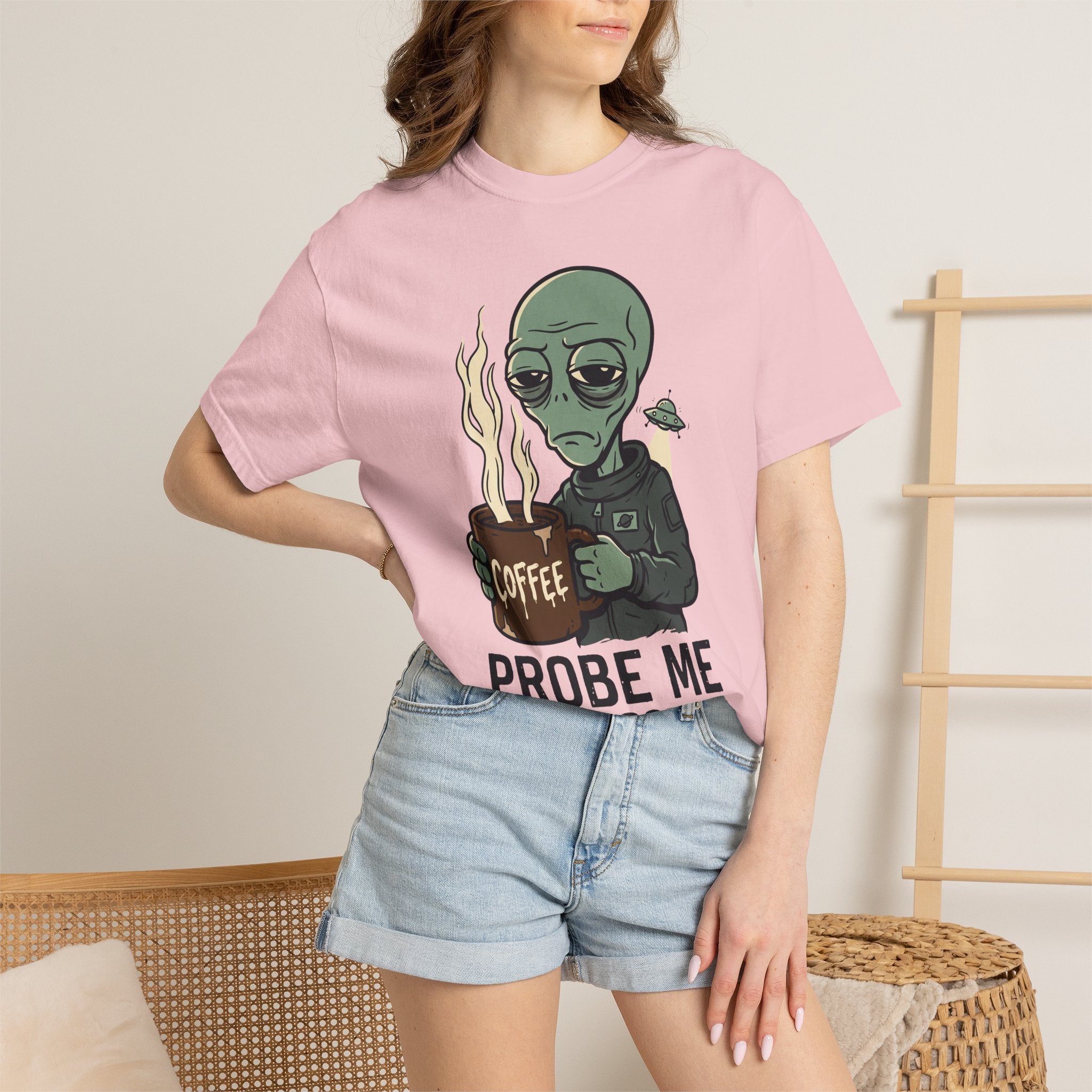 Pink T-shirt with alien holding coffee graphic and 'PROBE ME' text
