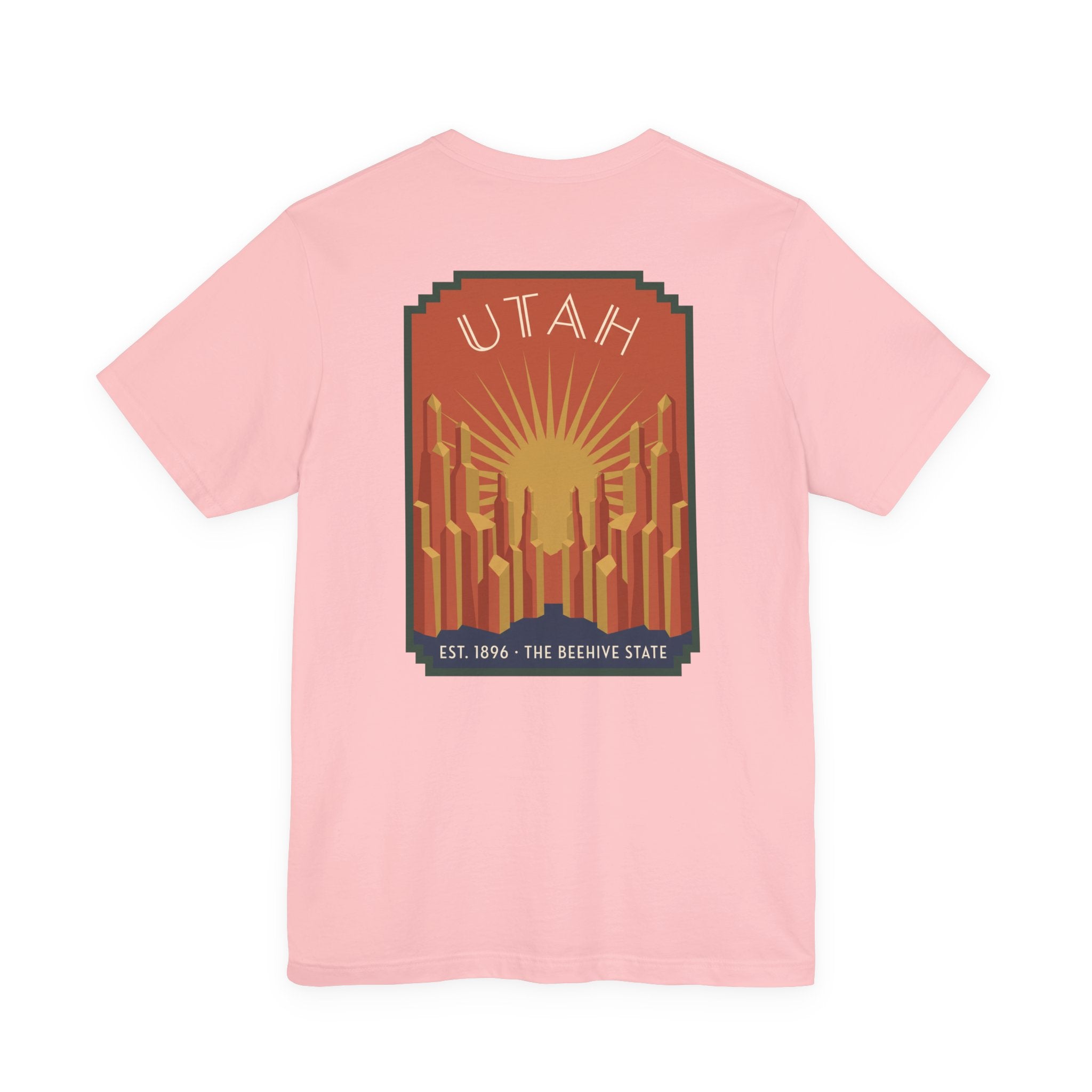 Light pink t-shirt with square art deco Utah skyline sunrise graphic on chest