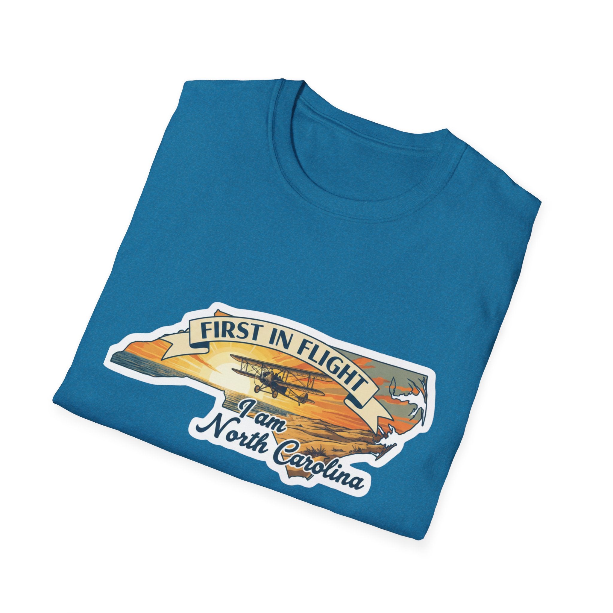Teal T-shirt with 'First in Flight' airplane graphic and North Carolina text