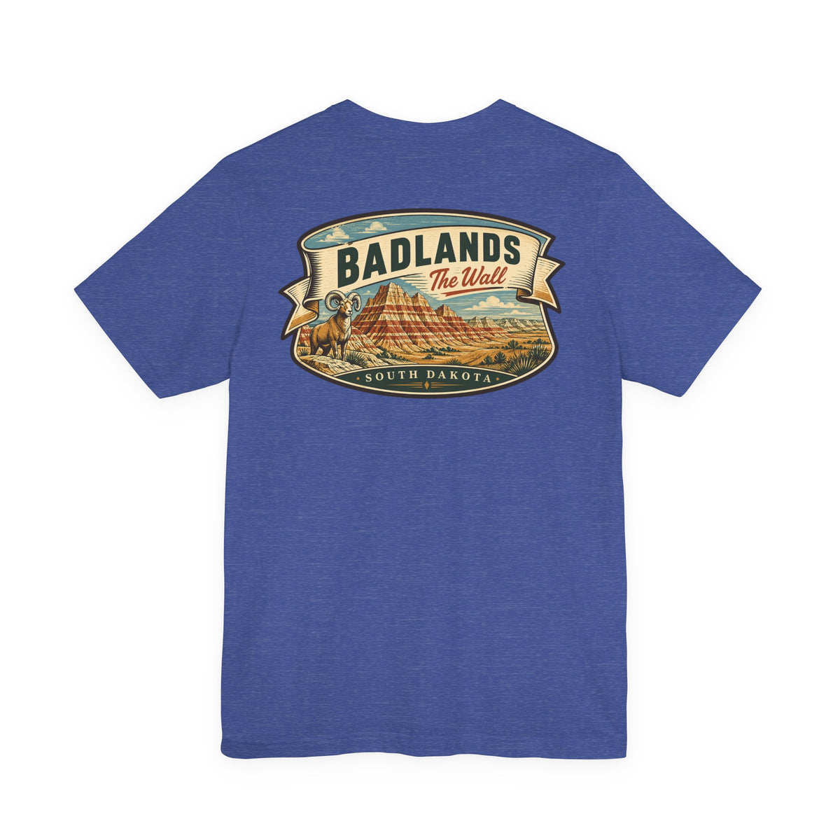 Blue T-shirt with “BADLANDS” landscape graphic and badge-style emblem across the chest