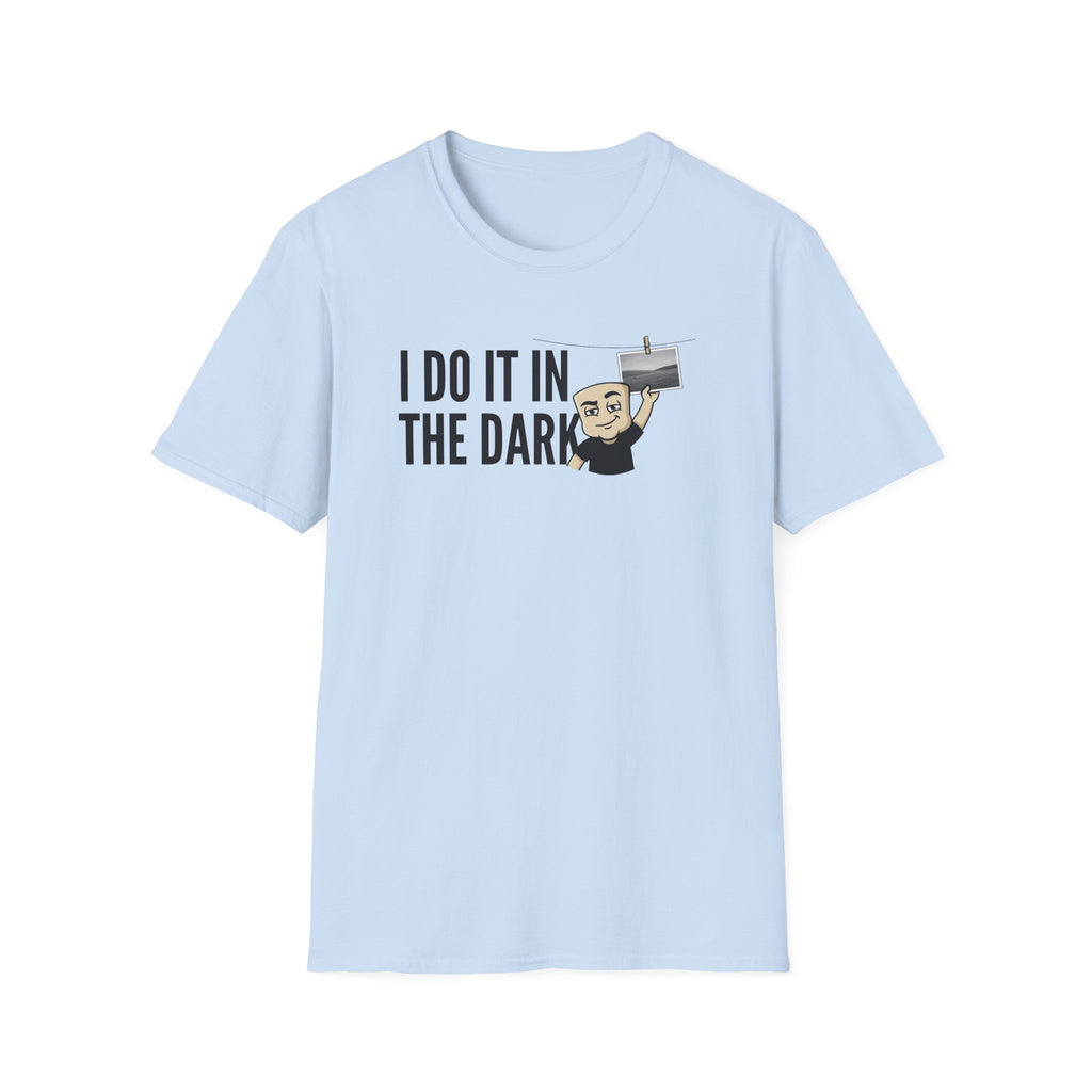 Light blue T-shirt with "I DO IT IN THE DARK" graphic and cartoon photographer