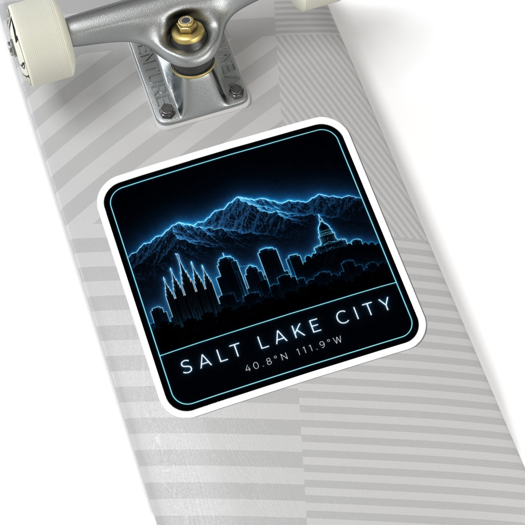 Neon Salt Lake City skyline kiss-cut sticker on skateboard, glowing city and mountains